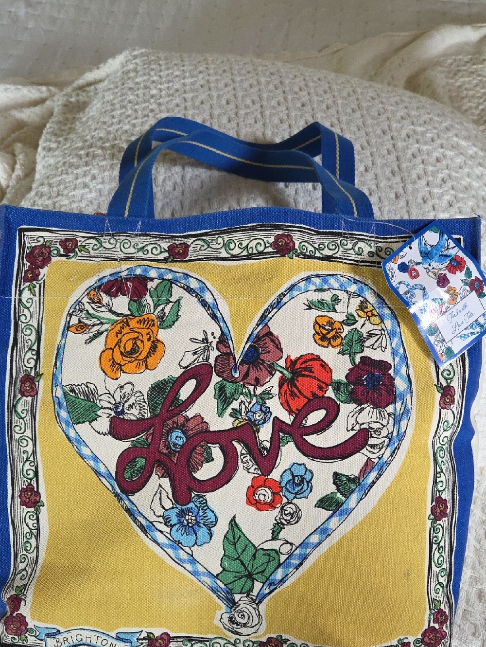 Brighton Yellow Canvas Tote with Blue Handles and Multicolor Floral Heart